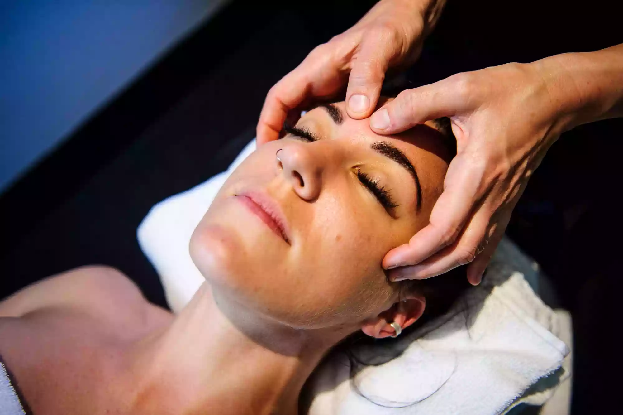 woman having a face massage, as photographed by a Sydney lifestyle photographer
